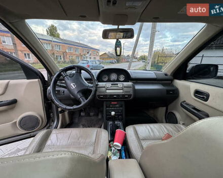 Серый Ниссан ИксТрейл, объемом двигателя 2 л и пробегом 249 тыс. км за 4999 $, фото 20 на Automoto.ua