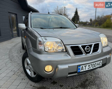 Серый Ниссан ИксТрейл, объемом двигателя 2 л и пробегом 249 тыс. км за 4999 $, фото 2 на Automoto.ua