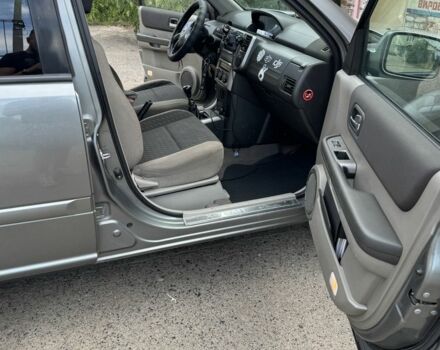 Серый Ниссан ИксТрейл, объемом двигателя 2.2 л и пробегом 265 тыс. км за 3550 $, фото 6 на Automoto.ua