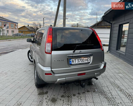 Серый Ниссан ИксТрейл, объемом двигателя 2 л и пробегом 249 тыс. км за 4999 $, фото 7 на Automoto.ua