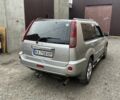 Серый Ниссан ИксТрейл, объемом двигателя 2.2 л и пробегом 275 тыс. км за 4000 $, фото 2 на Automoto.ua