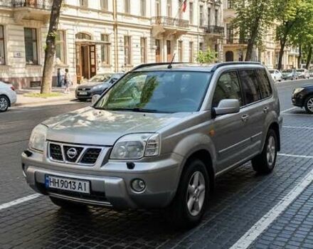 Серый Ниссан ИксТрейл, объемом двигателя 2 л и пробегом 231 тыс. км за 5300 $, фото 1 на Automoto.ua