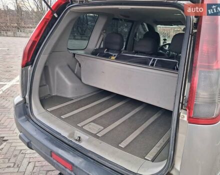 Серый Ниссан ИксТрейл, объемом двигателя 2.2 л и пробегом 295 тыс. км за 6400 $, фото 4 на Automoto.ua