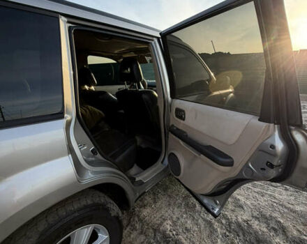 Серый Ниссан ИксТрейл, объемом двигателя 2.18 л и пробегом 351 тыс. км за 6700 $, фото 6 на Automoto.ua