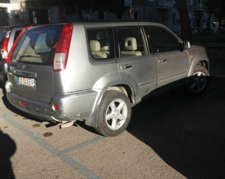 Серый Ниссан ИксТрейл, объемом двигателя 2 л и пробегом 188 тыс. км за 3500 $, фото 2 на Automoto.ua