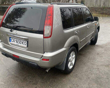 Серый Ниссан ИксТрейл, объемом двигателя 2 л и пробегом 276 тыс. км за 6400 $, фото 3 на Automoto.ua