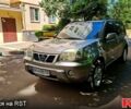 Серый Ниссан ИксТрейл, объемом двигателя 2 л и пробегом 219 тыс. км за 6700 $, фото 1 на Automoto.ua