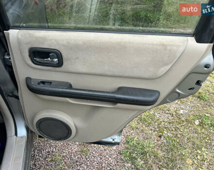 Серый Ниссан ИксТрейл, объемом двигателя 2.2 л и пробегом 401 тыс. км за 4400 $, фото 18 на Automoto.ua