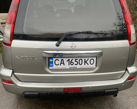 Серый Ниссан ИксТрейл, объемом двигателя 2 л и пробегом 276 тыс. км за 6400 $, фото 4 на Automoto.ua