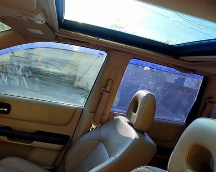 Сірий Ніссан ІксТрейл, об'ємом двигуна 2.5 л та пробігом 390 тис. км за 5000 $, фото 7 на Automoto.ua