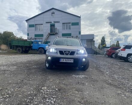 Серый Ниссан ИксТрейл, объемом двигателя 2 л и пробегом 200 тыс. км за 4950 $, фото 2 на Automoto.ua