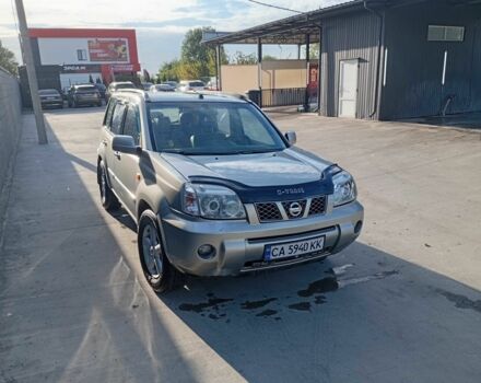 Сірий Ніссан ІксТрейл, об'ємом двигуна 2 л та пробігом 234 тис. км за 4100 $, фото 7 на Automoto.ua