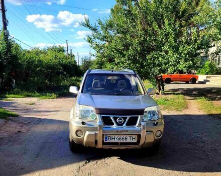 Сірий Ніссан ІксТрейл, об'ємом двигуна 2.5 л та пробігом 390 тис. км за 5000 $, фото 4 на Automoto.ua