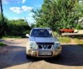 Сірий Ніссан ІксТрейл, об'ємом двигуна 2.5 л та пробігом 390 тис. км за 5000 $, фото 4 на Automoto.ua
