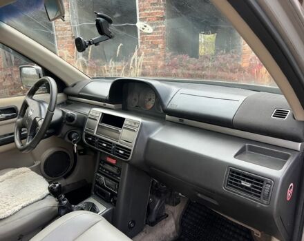 Серый Ниссан ИксТрейл, объемом двигателя 2.2 л и пробегом 400 тыс. км за 4400 $, фото 11 на Automoto.ua