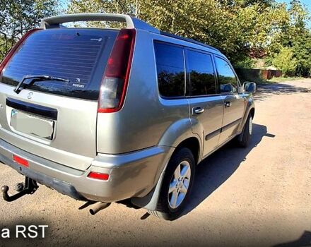 Серый Ниссан ИксТрейл, объемом двигателя 2.2 л и пробегом 280 тыс. км за 4000 $, фото 2 на Automoto.ua