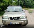 Серый Ниссан ИксТрейл, объемом двигателя 2 л и пробегом 258 тыс. км за 5999 $, фото 1 на Automoto.ua