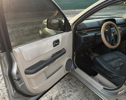 Серый Ниссан ИксТрейл, объемом двигателя 2.18 л и пробегом 351 тыс. км за 6700 $, фото 10 на Automoto.ua