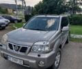 Сірий Ніссан ІксТрейл, об'ємом двигуна 2 л та пробігом 230 тис. км за 4900 $, фото 1 на Automoto.ua