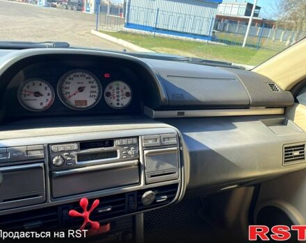 Серый Ниссан ИксТрейл, объемом двигателя 2 л и пробегом 320 тыс. км за 6500 $, фото 9 на Automoto.ua