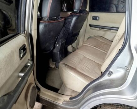 Серый Ниссан ИксТрейл, объемом двигателя 2 л и пробегом 260 тыс. км за 4000 $, фото 4 на Automoto.ua