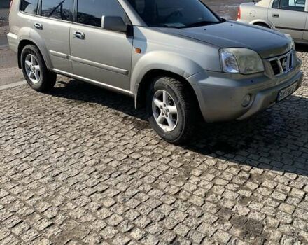 Сірий Ніссан ІксТрейл, об'ємом двигуна 2 л та пробігом 345 тис. км за 4700 $, фото 1 на Automoto.ua