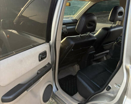 Серый Ниссан ИксТрейл, объемом двигателя 2.18 л и пробегом 351 тыс. км за 6700 $, фото 9 на Automoto.ua