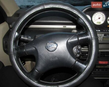 Серый Ниссан ИксТрейл, объемом двигателя 2 л и пробегом 197 тыс. км за 6500 $, фото 5 на Automoto.ua