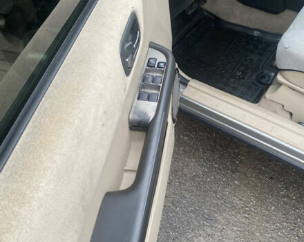 Серый Ниссан ИксТрейл, объемом двигателя 2 л и пробегом 276 тыс. км за 6400 $, фото 20 на Automoto.ua