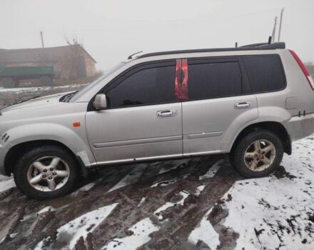 Серый Ниссан ИксТрейл, объемом двигателя 2 л и пробегом 260 тыс. км за 4000 $, фото 2 на Automoto.ua