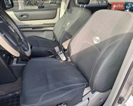 Серый Ниссан ИксТрейл, объемом двигателя 2.2 л и пробегом 295 тыс. км за 6400 $, фото 5 на Automoto.ua