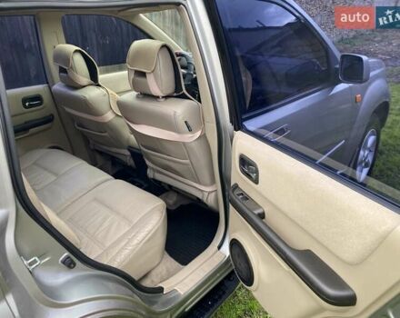 Серый Ниссан ИксТрейл, объемом двигателя 2 л и пробегом 221 тыс. км за 5000 $, фото 15 на Automoto.ua