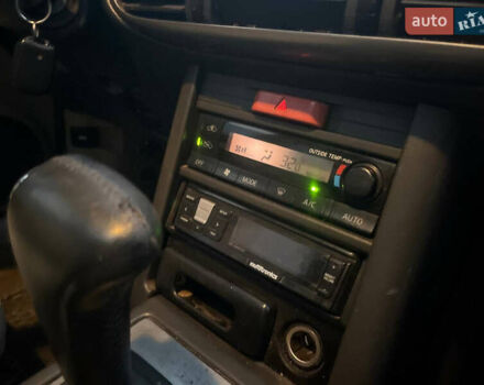 Серый Ниссан ИксТрейл, объемом двигателя 2.5 л и пробегом 320 тыс. км за 4800 $, фото 6 на Automoto.ua