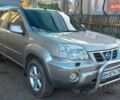 Сірий Ніссан ІксТрейл, об'ємом двигуна 2 л та пробігом 253 тис. км за 5500 $, фото 2 на Automoto.ua