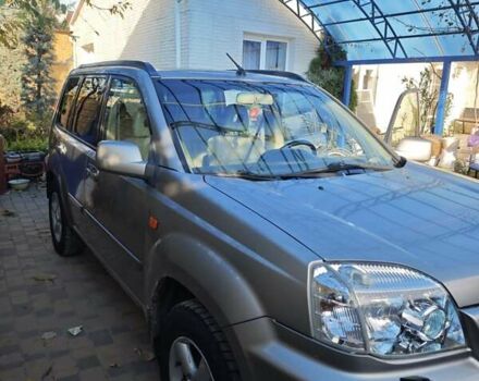 Сірий Ніссан ІксТрейл, об'ємом двигуна 2 л та пробігом 320 тис. км за 5500 $, фото 9 на Automoto.ua