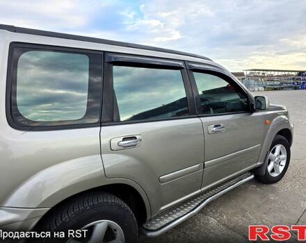 Серый Ниссан ИксТрейл, объемом двигателя 2 л и пробегом 220 тыс. км за 5800 $, фото 7 на Automoto.ua