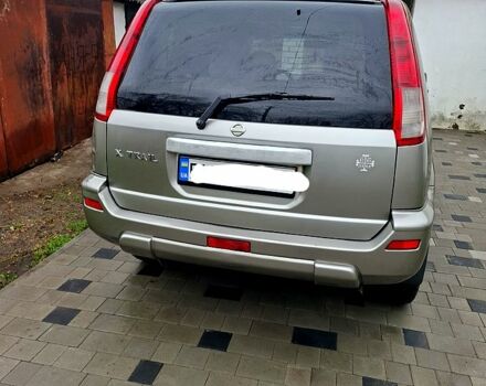 Серый Ниссан ИксТрейл, объемом двигателя 2.5 л и пробегом 286 тыс. км за 5800 $, фото 2 на Automoto.ua