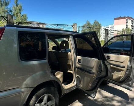 Серый Ниссан ИксТрейл, объемом двигателя 2.2 л и пробегом 281 тыс. км за 6000 $, фото 5 на Automoto.ua