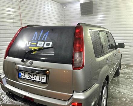 Сірий Ніссан ІксТрейл, об'ємом двигуна 2 л та пробігом 250 тис. км за 4600 $, фото 2 на Automoto.ua