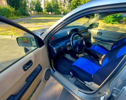 Сірий Ніссан ІксТрейл, об'ємом двигуна 2 л та пробігом 305 тис. км за 5200 $, фото 6 на Automoto.ua