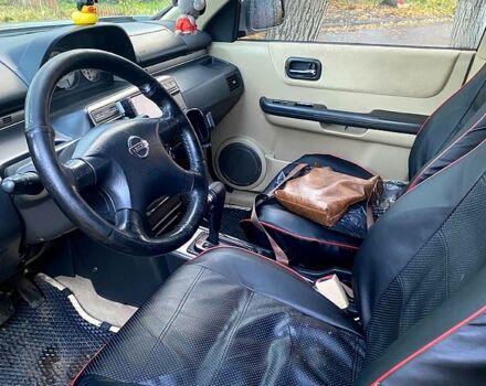 Серый Ниссан ИксТрейл, объемом двигателя 2 л и пробегом 251 тыс. км за 5600 $, фото 9 на Automoto.ua