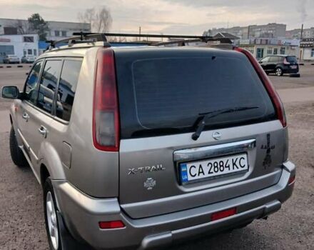 Серый Ниссан ИксТрейл, объемом двигателя 2.2 л и пробегом 256 тыс. км за 8000 $, фото 1 на Automoto.ua