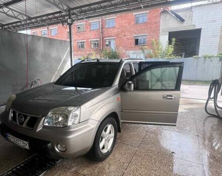 Серый Ниссан ИксТрейл, объемом двигателя 2 л и пробегом 262 тыс. км за 7079 $, фото 2 на Automoto.ua