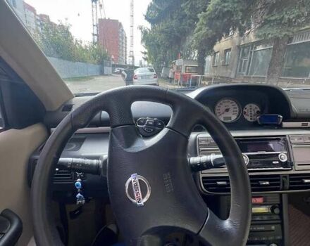 Серый Ниссан ИксТрейл, объемом двигателя 2 л и пробегом 262 тыс. км за 7079 $, фото 23 на Automoto.ua