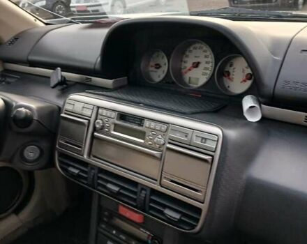 Серый Ниссан ИксТрейл, объемом двигателя 2.2 л и пробегом 256 тыс. км за 8000 $, фото 5 на Automoto.ua