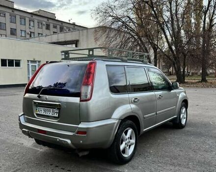 Сірий Ніссан ІксТрейл, об'ємом двигуна 2 л та пробігом 312 тис. км за 5300 $, фото 2 на Automoto.ua