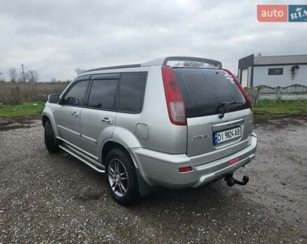 Серый Ниссан ИксТрейл, объемом двигателя 2.5 л и пробегом 450 тыс. км за 7000 $, фото 9 на Automoto.ua