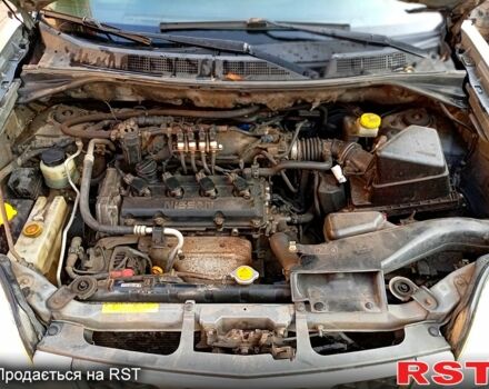 Сірий Ніссан ІксТрейл, об'ємом двигуна 2.5 л та пробігом 240 тис. км за 5800 $, фото 10 на Automoto.ua