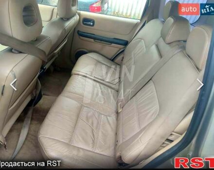 Сірий Ніссан ІксТрейл, об'ємом двигуна 2 л та пробігом 200 тис. км за 4000 $, фото 5 на Automoto.ua