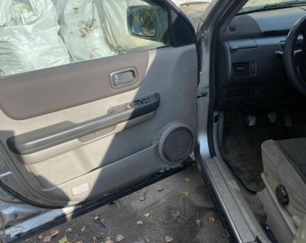 Серый Ниссан ИксТрейл, объемом двигателя 2.2 л и пробегом 383 тыс. км за 4600 $, фото 11 на Automoto.ua